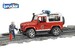 Позашляховик Land Rover Defender Station Wagon пожежний з фігуркою синій, червоний, Bruder дополнительное фото 4.