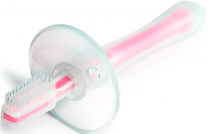 Зубные пасты, щетки и аксессуары: Зубная щетка с ограничителем (силиконовая) розовая, Canpol babies