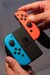 Игровая консоль Nintendo Switch (сине-красная) дополнительное фото 10.