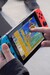 Игровая консоль Nintendo Switch (сине-красная) дополнительное фото 12.