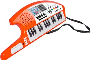 Музичні інструменти: Клавишная гітара, ігровий музичний інструмент
