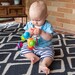 Іграшка-прорізувач Сенсорні кулі, Fat Brain Toys Wimzle дополнительное фото 4.