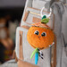 М'яка іграшка-підвіска «Апельсинка з прорізувачем», Lamaze дополнительное фото 4.